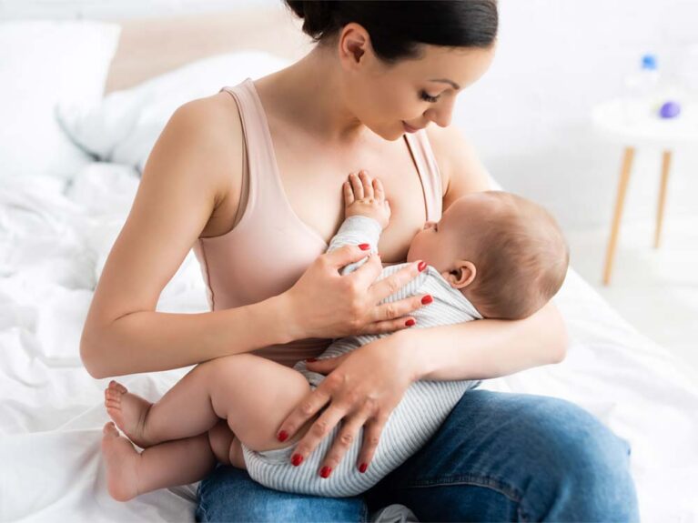 Mother breastfeeding baby